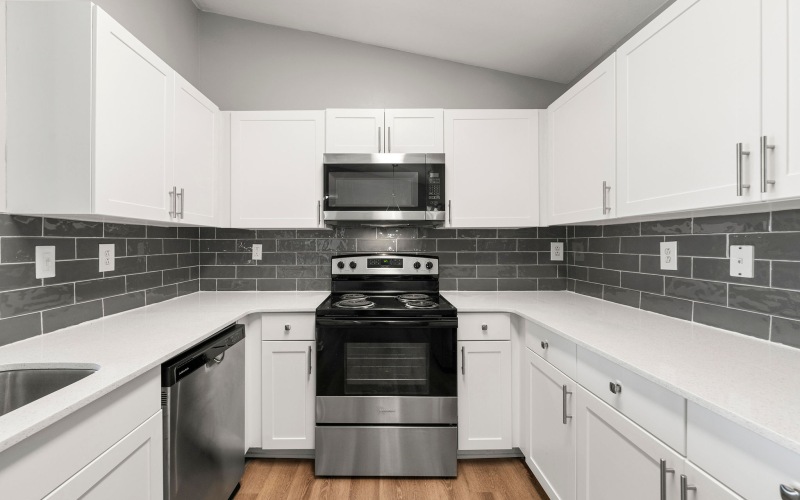 Spacious kitchen with ample counter space and stylish cabinetry