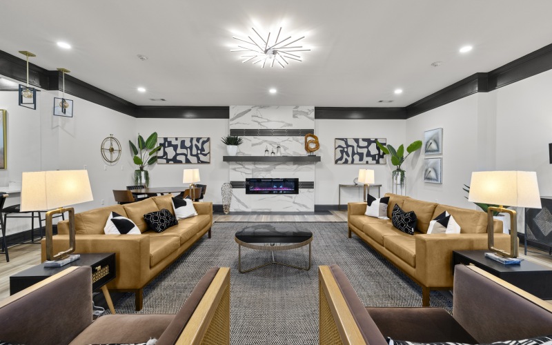 a community lounge with a fireplace