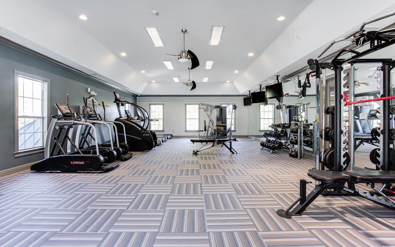 a gym with treadmills